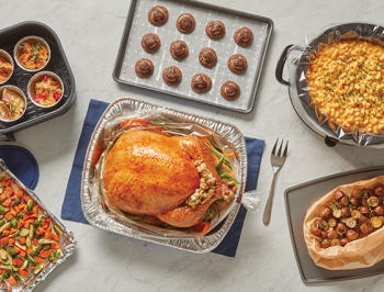 various holiday foods sitting on a kitchen island